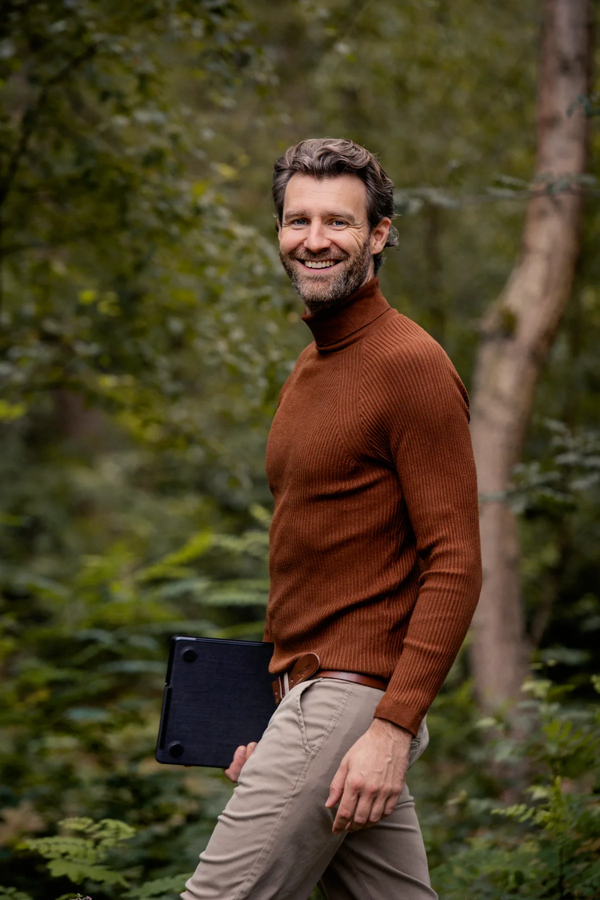 Rob Segers in the forest with a Bitcoin hardware device