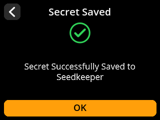 ShieldSigner: Large icon status screen. ShieldSigner confirms Secret Saved on SeedKeeper A.