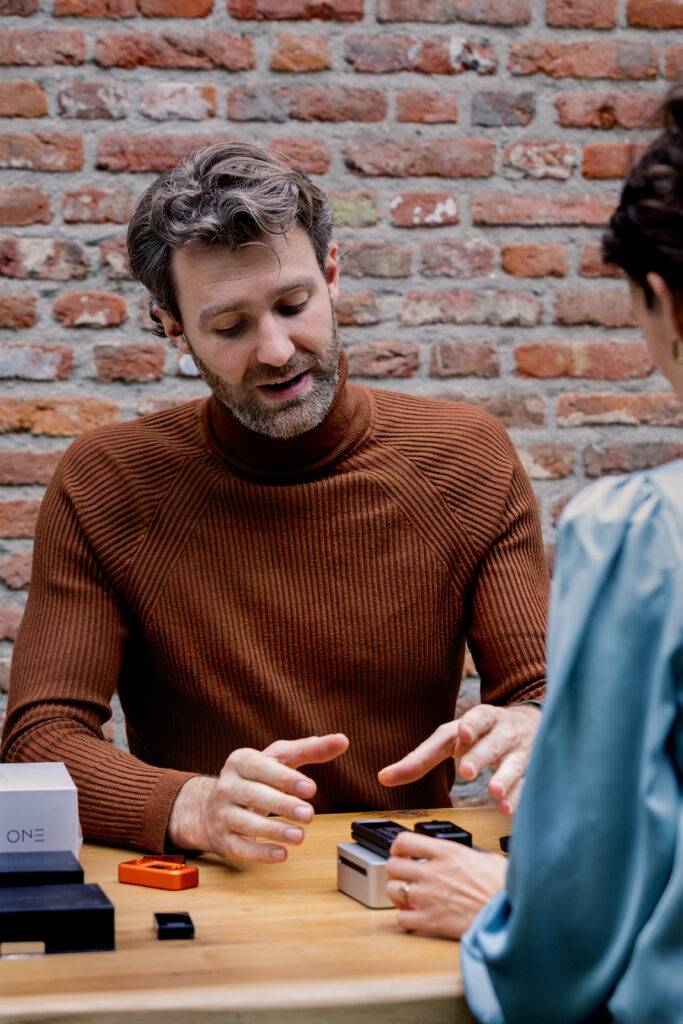 Rob Segers bitcoin security consultant with a client discussing hardware wallets
